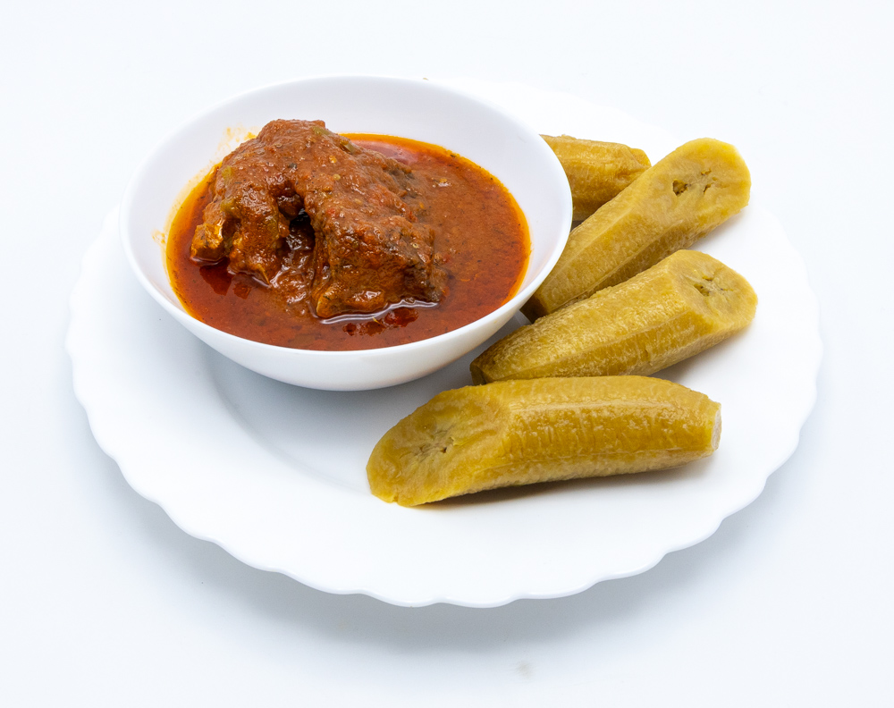 Cooked Plantains to eat with tomato sauce with either fish or beef