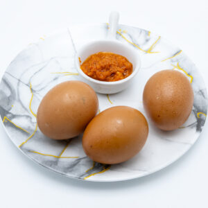 Boiled eggs with spiced sauce